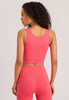 Back view of a women model wearing HA juicy melon microfibre Tank Top