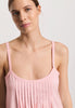 Close-up view of a women model wearing HA coral pink cotton Spaghetti Dress 90cm