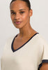 Close-up view of a women model wearing HA antique white cotton S/SLV Nightdress 85cm