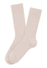 General view of a women model wearing HA light linen wool Socks
