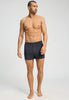 Full-body view of a men model wearing HA charcoal melange modal/viscose/tencel Boxers