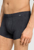 Close-up view of a men model wearing HA charcoal melange modal/viscose/tencel Pants