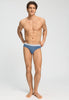 Full-body view of a men model wearing HA stormy gray/tanzanite cotton Briefs 2Pack