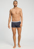 General view of a men model wearing HA stormy gray/tanzanite cotton Pants 2Pack