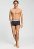 Full-body view of a men model wearing HA charcoal art / smokey olive cotton Pants 2Pack