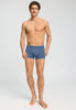 Full-body view of a men model wearing HA stormy gray/tanzanite cotton Pants 2Pack