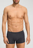 General view of a men model wearing HA charcoal art / smokey olive cotton Pants 2Pack