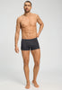 Full-body view of a men model wearing HA charcoal art / smokey olive cotton Pants 2Pack