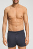 Front view of a men model wearing HA stormy gray cotton Boxers