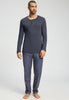Full-body view of a men model wearing HA stormy gray cotton L/SLV Henley Shirt