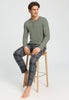 Full-body view of a men model wearing HA shadow cotton L/SLV Henley Shirt