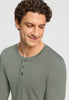 Close-up view of a men model wearing HA shadow cotton L/SLV Henley Shirt