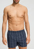 Front view of a men model wearing HA checked blue cotton Boxers