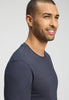Close-up view of a men model wearing HA stormy gray cotton L/SLV Shirt