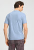 Back view of a men model wearing HA cashmere blue cotton S/SLV Shirt