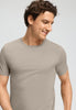 Close-up view of a men model wearing HA wooly beige cotton S/SLV Shirt