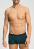 Front view of a men model wearing HA pine leaf microfibre Pants