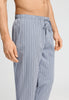 Close-up view of a men model wearing HA jeans lines cotton Long Pants