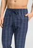 Close-up view of a men model wearing HA checked blue cotton Long Pants