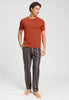 Full-body view of a men model wearing HA pinecone stripes cotton Long Pants