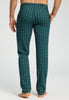 Back view of a men model wearing HA pisces garden cotton Long Pants
