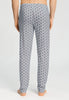 Back view of a men model wearing HA celestial light cotton Long Pants