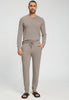 Full-body view of a men model wearing HA toffee melange modal/viscose/tencel Long Pants