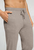 Close-up view of a men model wearing HA toffee melange modal/viscose/tencel Long Pants