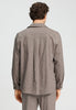 Back view of a men model wearing HA earthy woven cotton Shirt 1/1 Arm