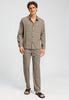 Full-body view of a men model wearing HA earthy woven cotton Long Pants