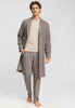 Full-body view of a men model wearing HA earthy woven cotton Robe