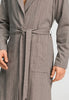 Close-up view of a men model wearing HA earthy woven cotton Robe