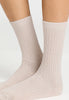 Close-up view of a women model wearing HA light linen wool Socks