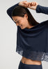 Close-up view of a women model wearing HA deep navy modal/viscose/tencel L/SLV Pajama