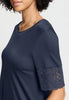 Close-up view of a women model wearing HA deep navy modal/viscose/tencel S/SLV Nightdress 95cm