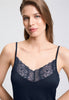 Close-up view of a women model wearing HA deep navy modal/viscose/tencel Negligee 90cm
