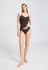 Full-body view of a women model wearing HA dark mocha cotton Padded Spaghetti Top