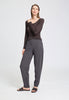 Full-body view of a women model wearing HA dark sesame cotton Long Pants