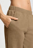 Close-up view of a women model wearing HA desert clay cotton Long Pants