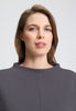 Close-up view of a women model wearing HA dark sesame cotton Pullover