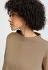 Close-up view of a women model wearing HA desert clay cotton Pullover