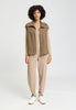 Full-body view of a women model wearing HA suede camel cotton Zippered vest