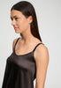 Close-up view of a women model wearing HA dark mocha silk Spaghetti Top