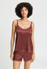 Front view of a women model wearing HA apple butter silk Spaghetti Top