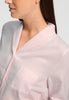 Close-up view of a women model wearing HA rose check cotton L/SLV Shirt
