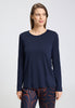 Front view of a women model wearing HA deep navy cotton L/SLV Shirt