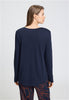 Back view of a women model wearing HA deep navy cotton L/SLV Shirt