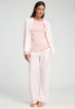 Full-body view of a women model wearing HA rosewater cotton L/SLV Shirt