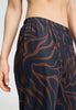 Close-up view of a women model wearing HA navy wildness cotton Long Pants