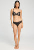 Full-body view of a women model wearing HA black microfibre Midi Briefs